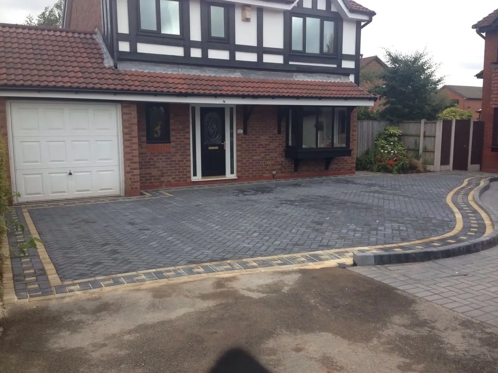 New block paving driveway with border course