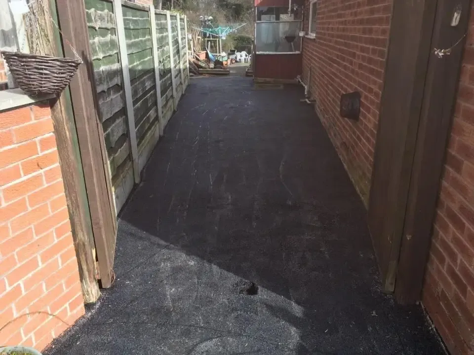 Side path relaid in block paving