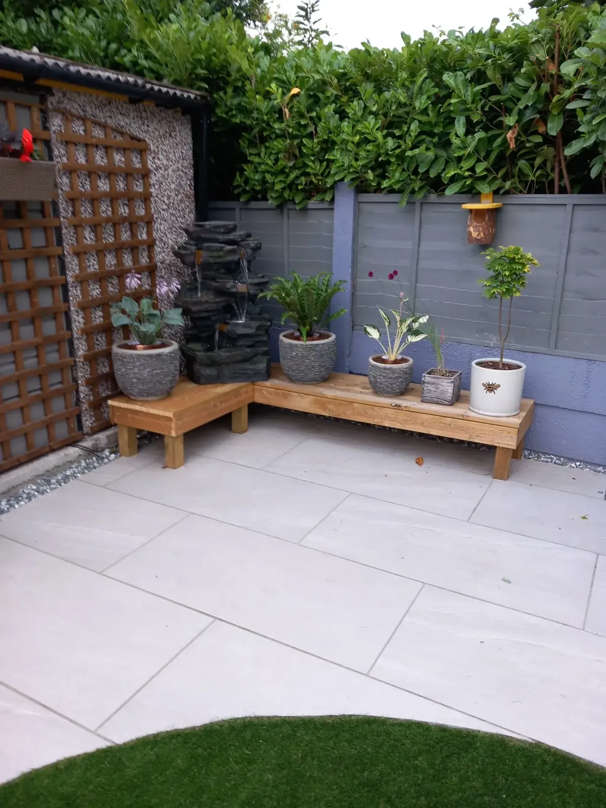 Patio with a neat edge onto the lawn
